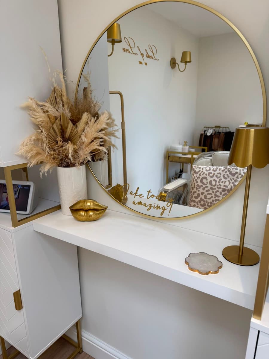 The styling station at Amy's Stevenage studio, with a round gold mirror and dried pampas